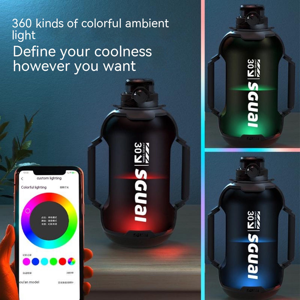 Matte black sports water bottle with carry handles and color-changing LED light