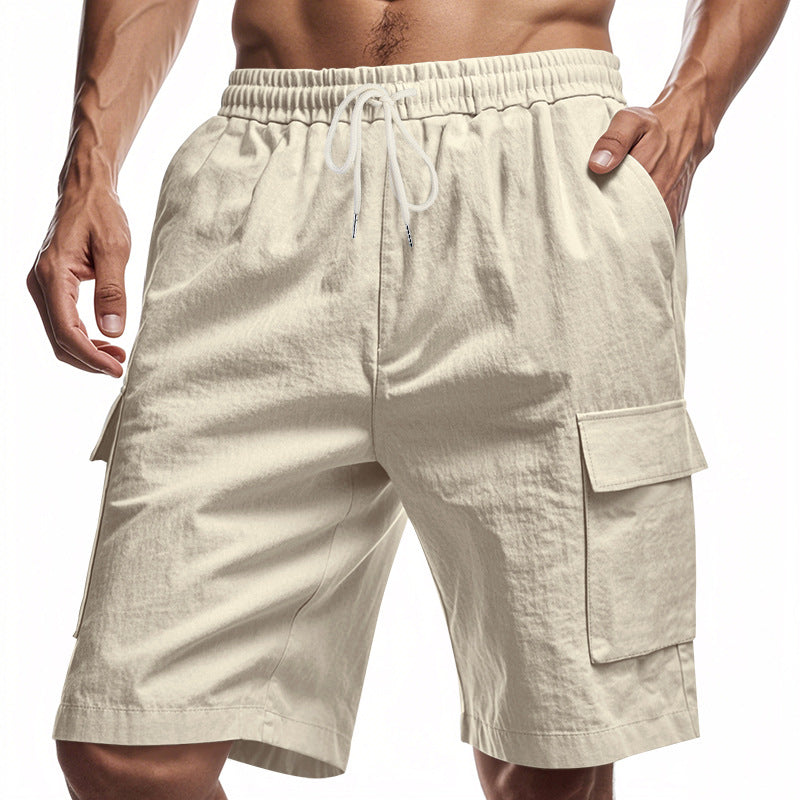 Beige linen cargo shorts with elastic waistband and drawstring, side flap pockets
