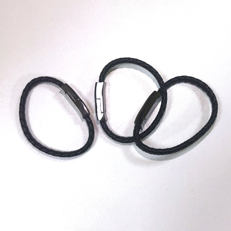 Black braided USB charging cable with looped cord and connector plugs