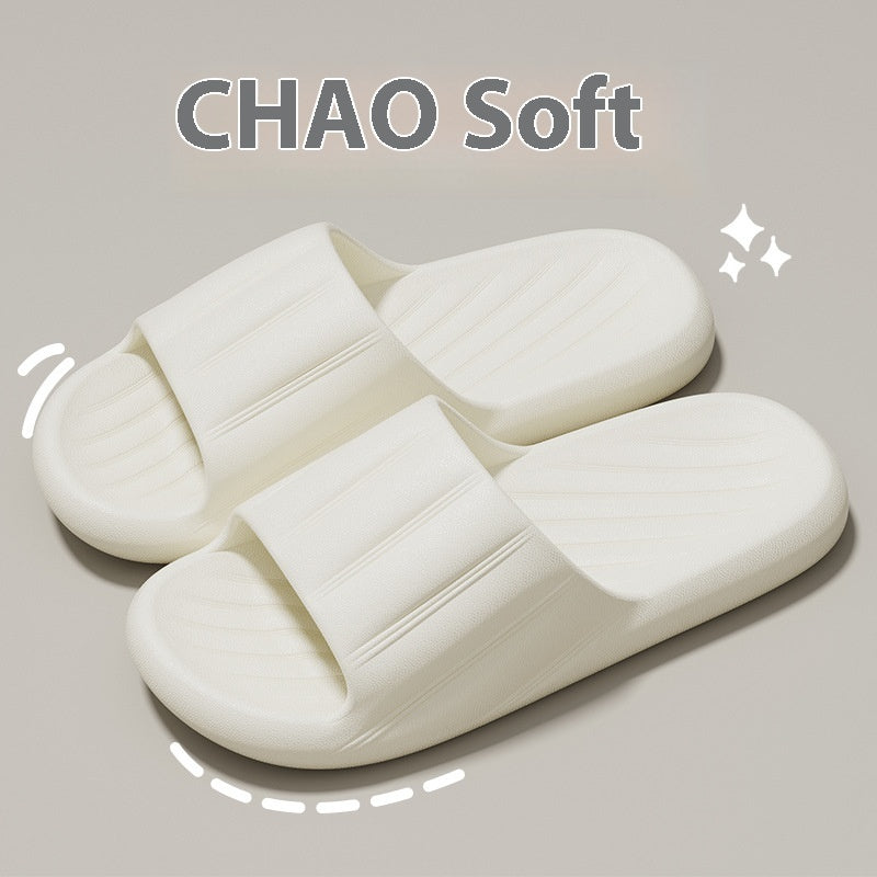 Cream-white slide slippers with striped strap and molded ribbed footbed