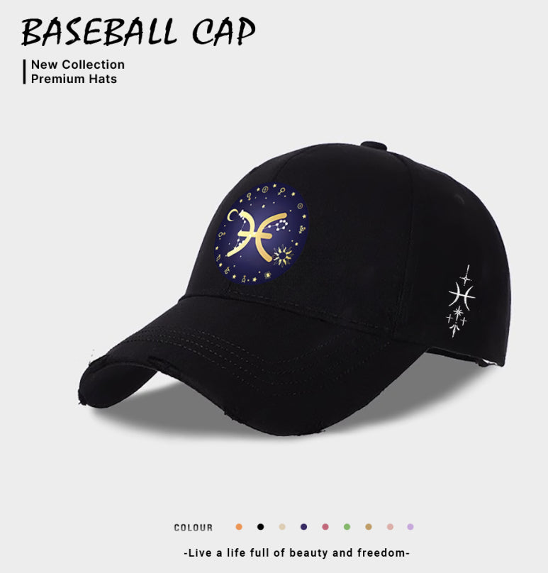Black baseball cap with blue-and-gold zodiac emblem on front, white side star sign