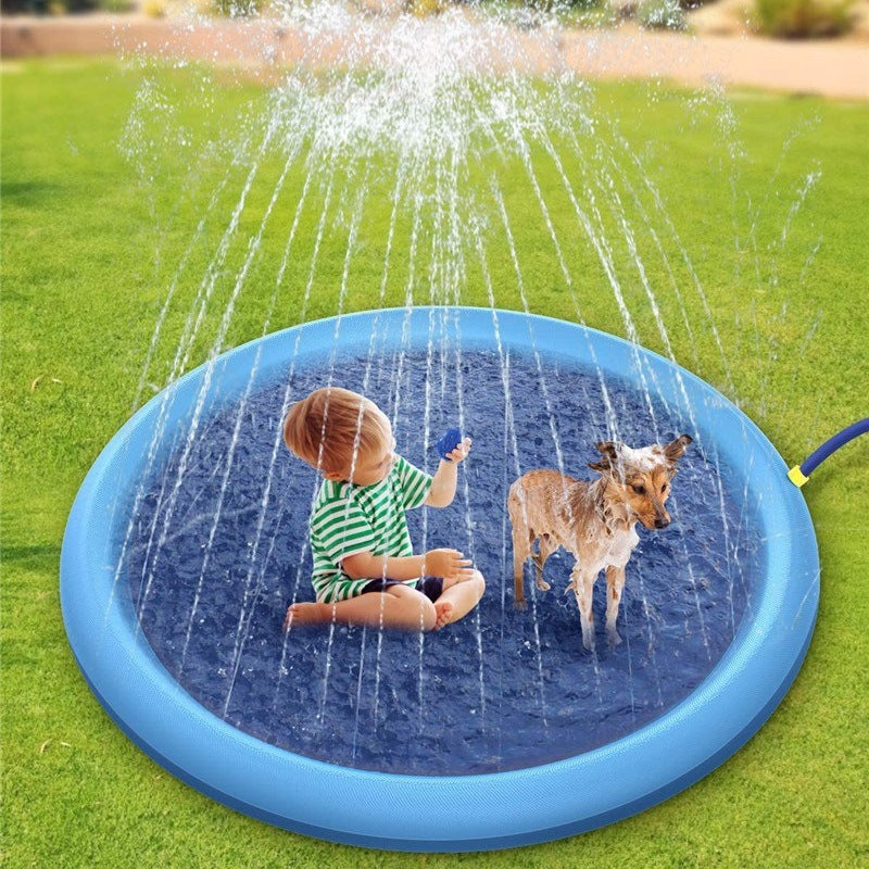 Blue round splash pad with water spray, child sitting with dog in shallow pool