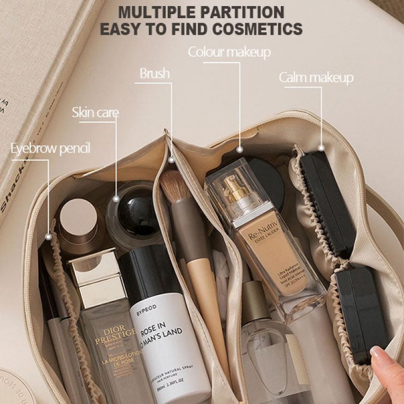 Large cosmetic bag interior with multiple partitions for skincare and makeup items