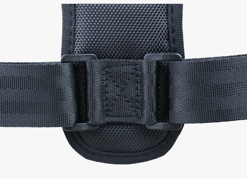 Close-up of black adjustable back strap buckle on posture corrector