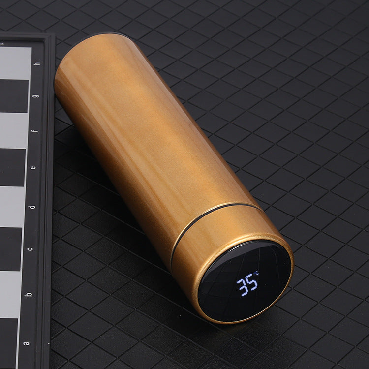 Gold 500ml smart vacuum bottle with side LED temperature display reading 35°C