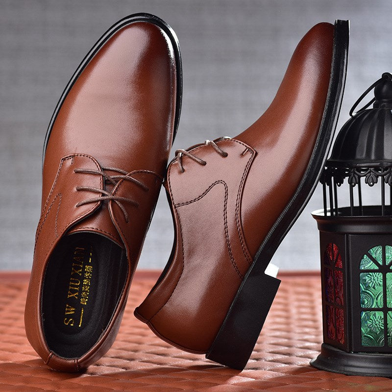 Men's pointed-toe lace-up dress shoes, brown leather with contrast stitching and laces.