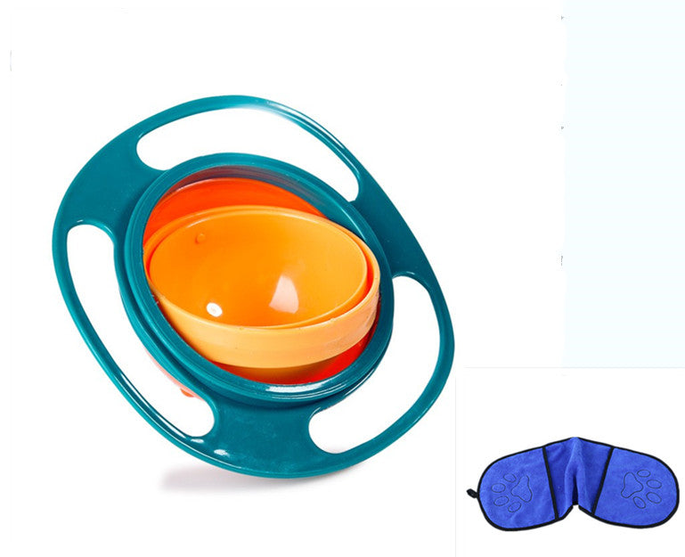 Rotating spill-proof bowl with teal outer ring and orange inner bowl
