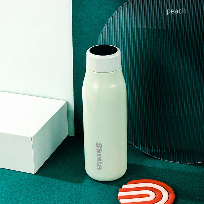 Cream white vacuum flask with temperature display, stainless steel thermos bottle