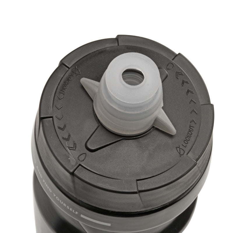 Black bottle lid with flip spout and circular drinking-valve opening