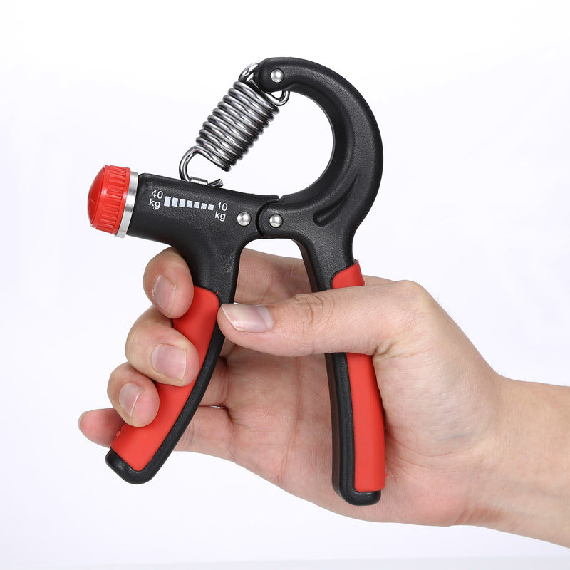 Finger exerciser hand grip with black body and red handles, held by two hands