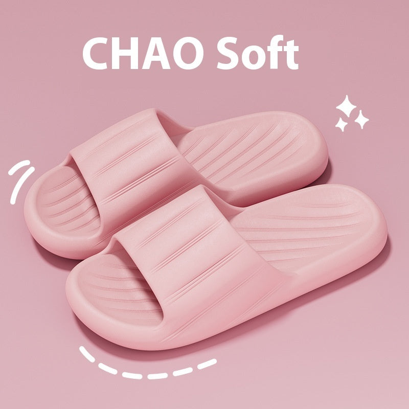Pink slide slippers with striped strap and molded ribbed footbed