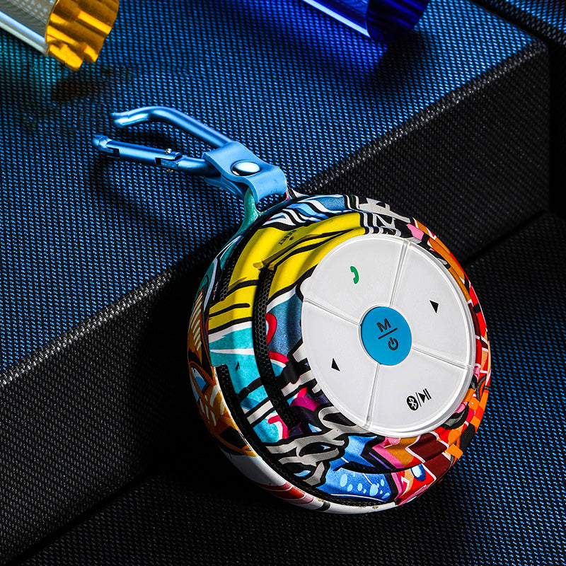 Portable Bluetooth speaker, graffiti shell with blue clip and circular control panel
