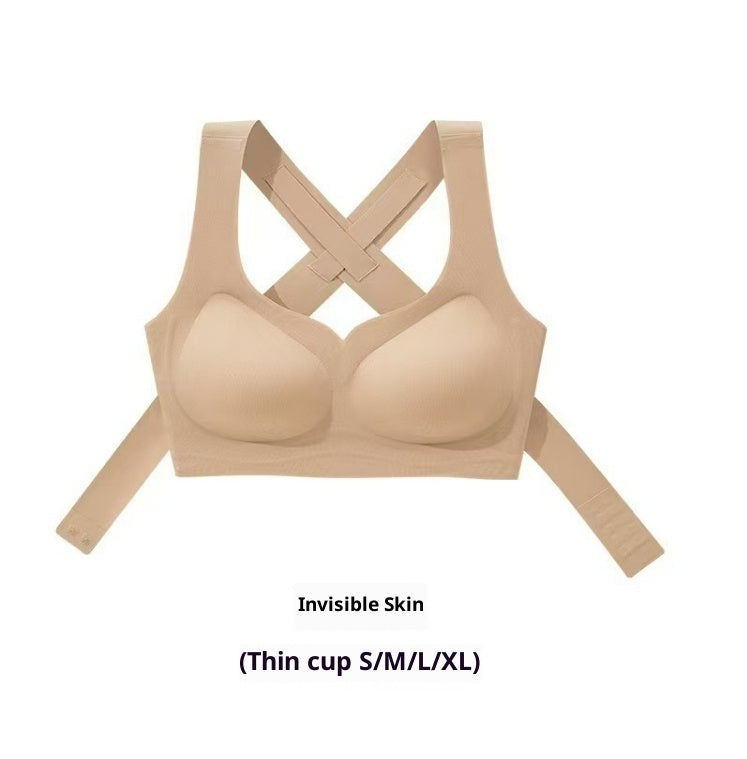 Nude front-closure posture bra with crisscross back straps and padded cups