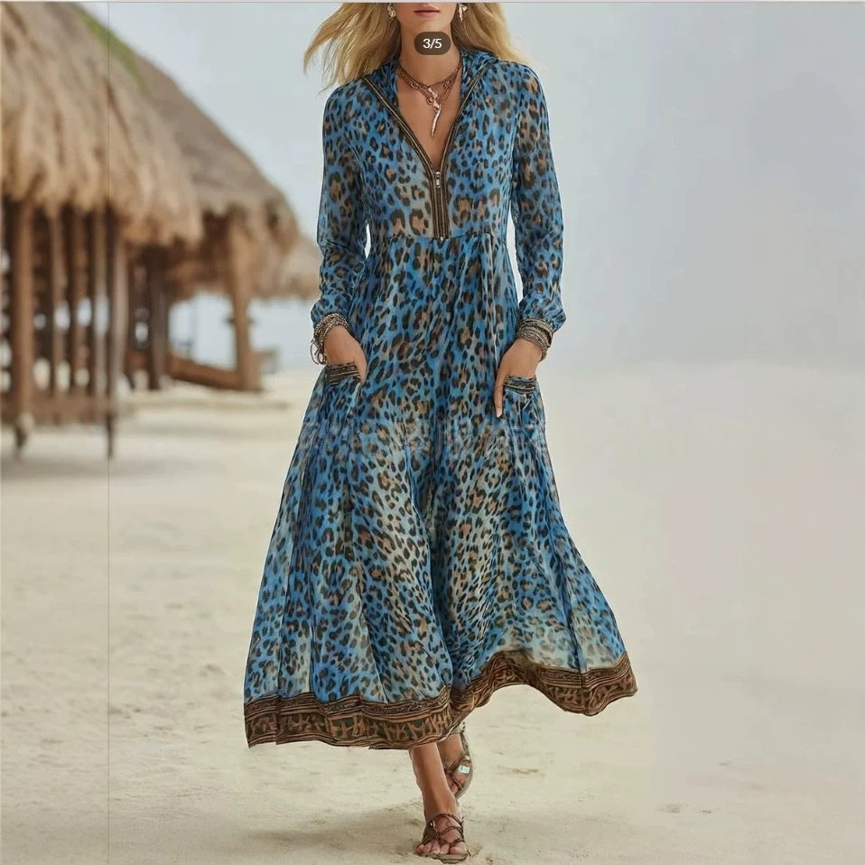 Blue leopard-print hooded maxi dress with long sleeves, V-neck placket, and tiered skirt