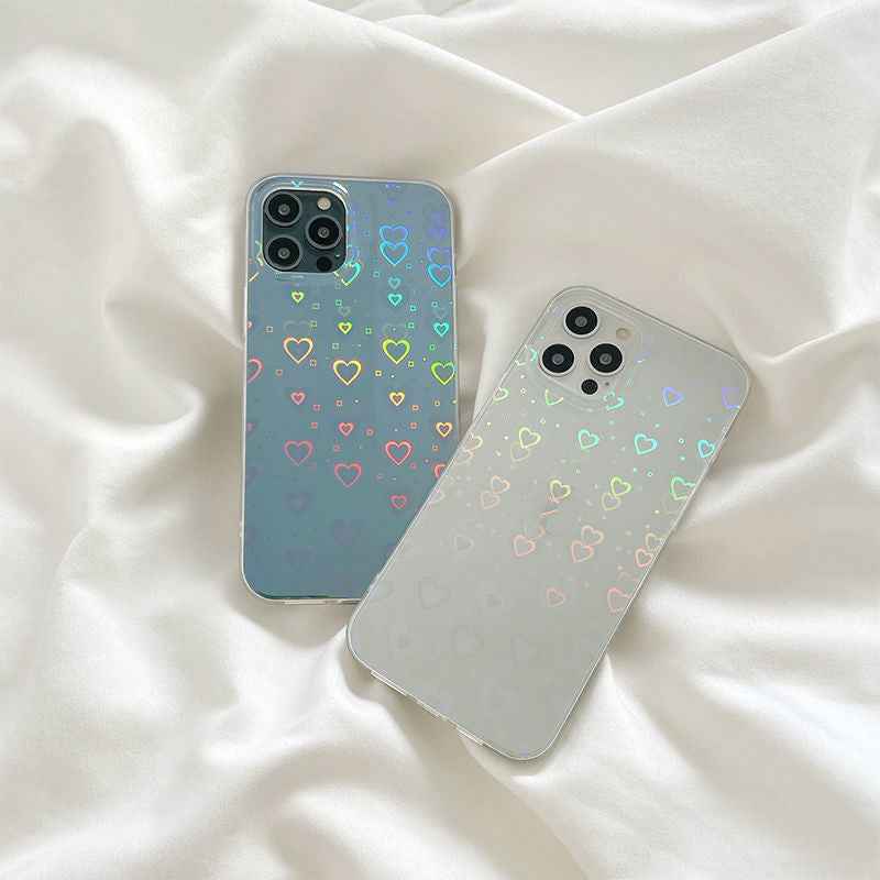 Two heart-pattern silicone phone cases, light blue and translucent, with camera cutouts
