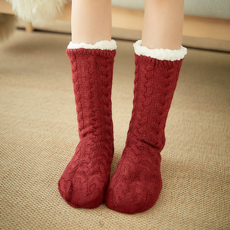 Red fleece cable socks with white cuff, thick knit