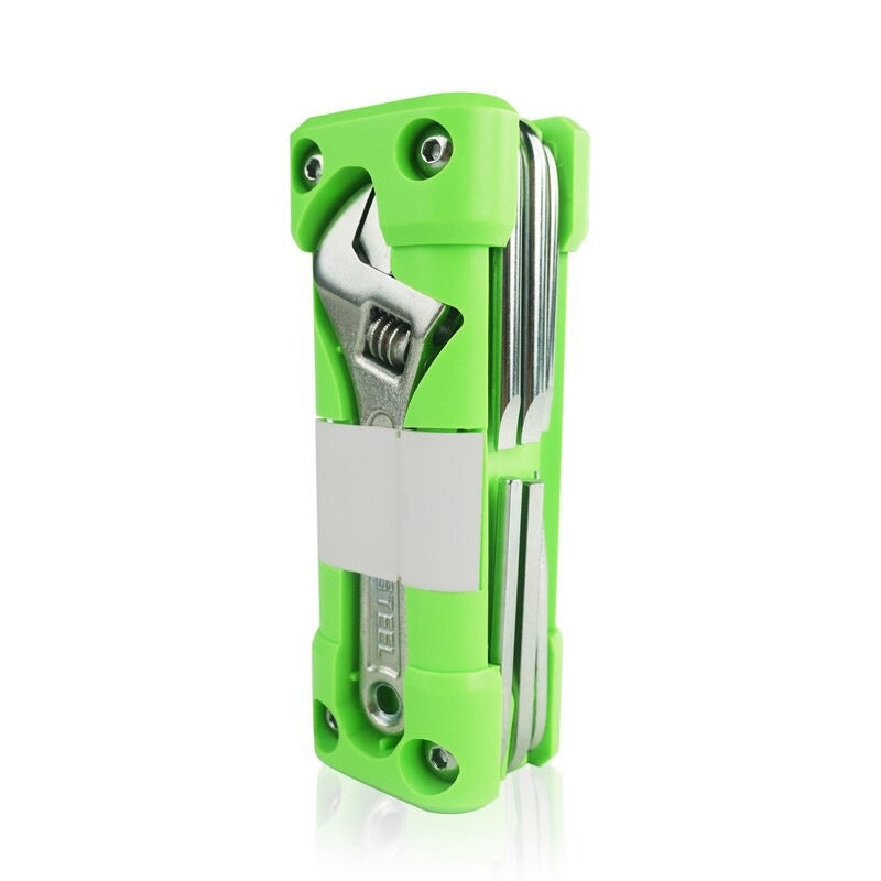 Green portable tool set with wrench, bits, and storage clip