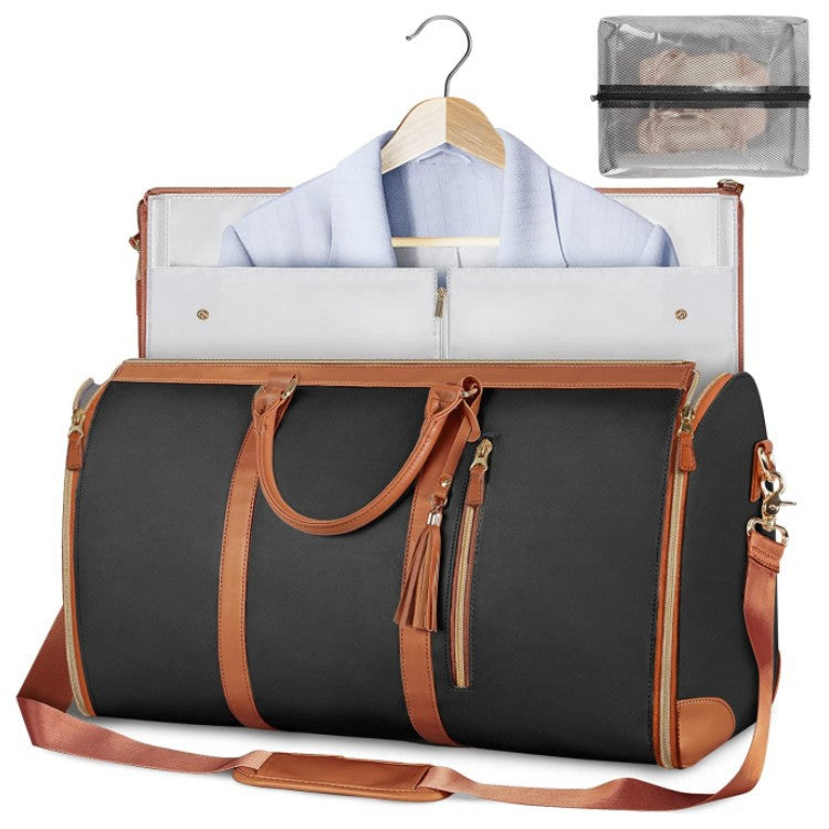 Black travel duffle bag with tan trim, open garment organizer, hanging jacket, shoulder strap