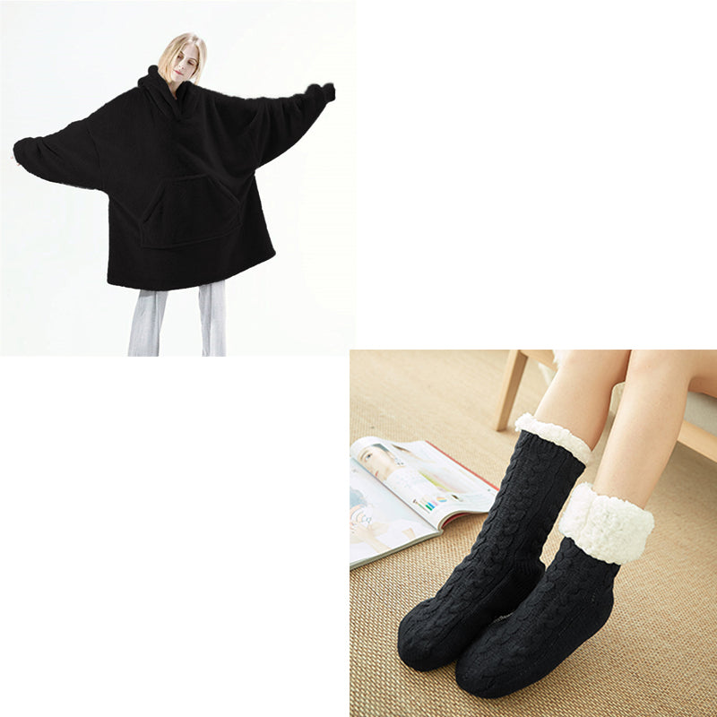 Black hooded fleece sweatshirt and black cable fleece socks with white cuffs