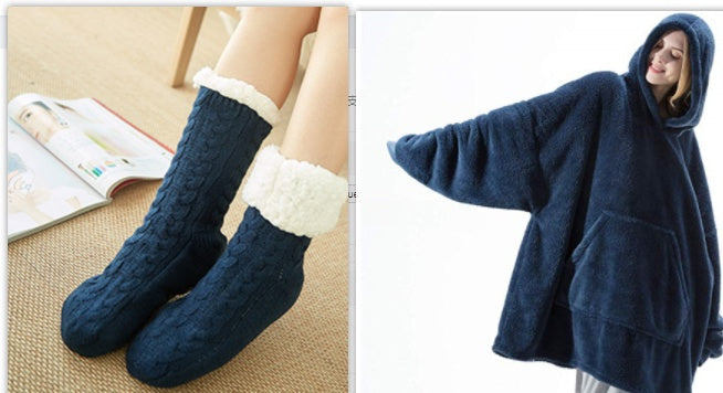 Navy hooded fleece sweatshirt and navy cable fleece socks with white cuffs