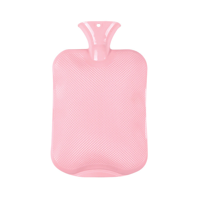 Pink hot water bottle with textured grip surface and neck stopper