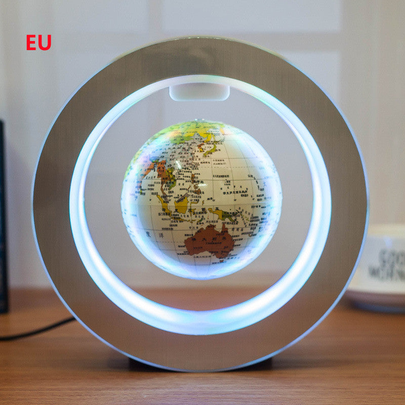 Floating LED world globe with bright white lit ring and detailed globe map on dark base