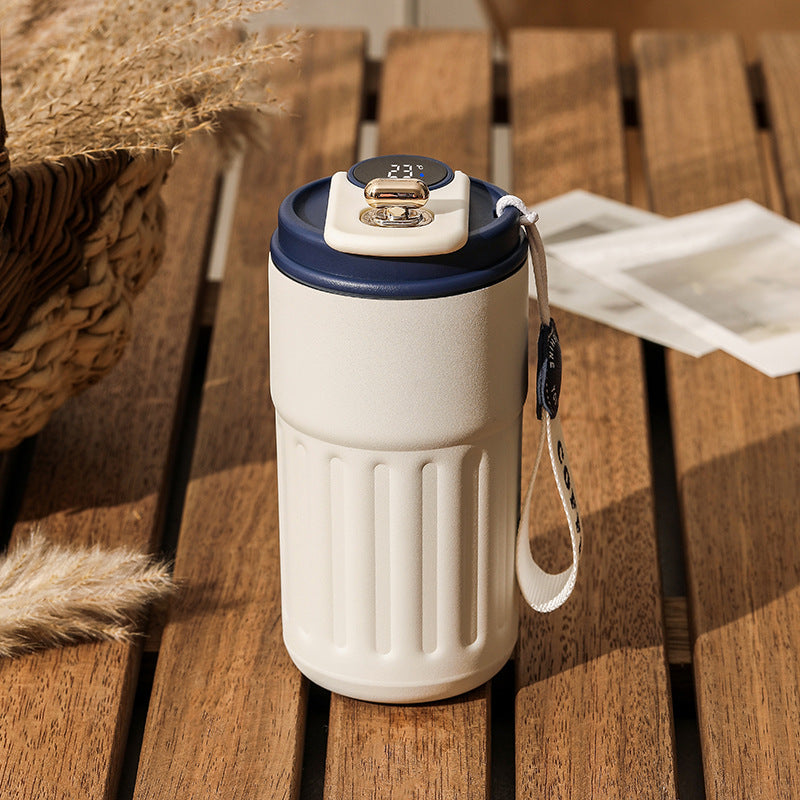 450ml insulated thermal bottle with white body, blue lid, digital temperature display