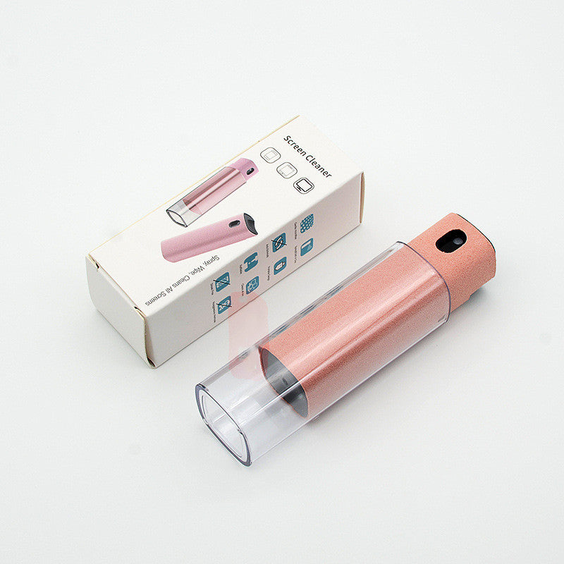 Pink microfiber screen cleaner cylinder with clear bottom base, shown with box