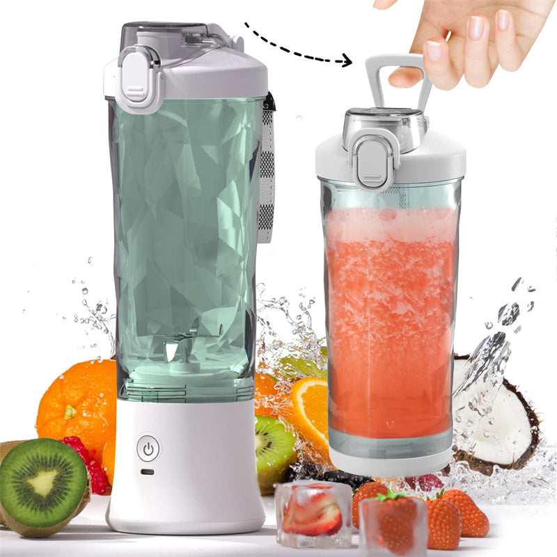 Portable blender with dark green blending cup and white base, shown with smoothie beaker