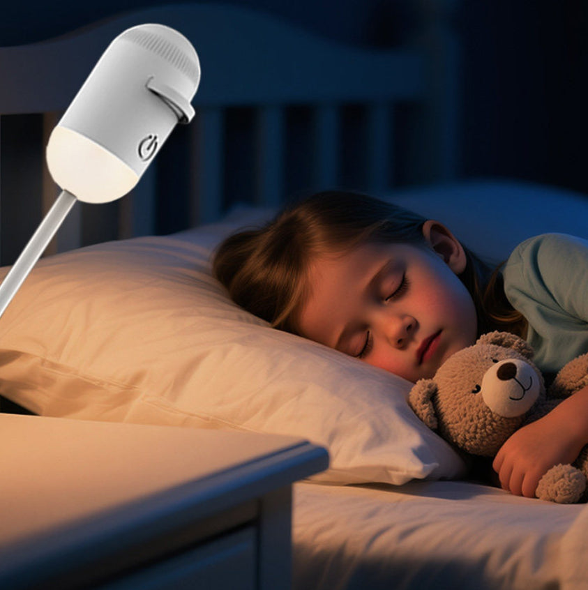 White bedside USB night light lamp with warm glow and angled stem