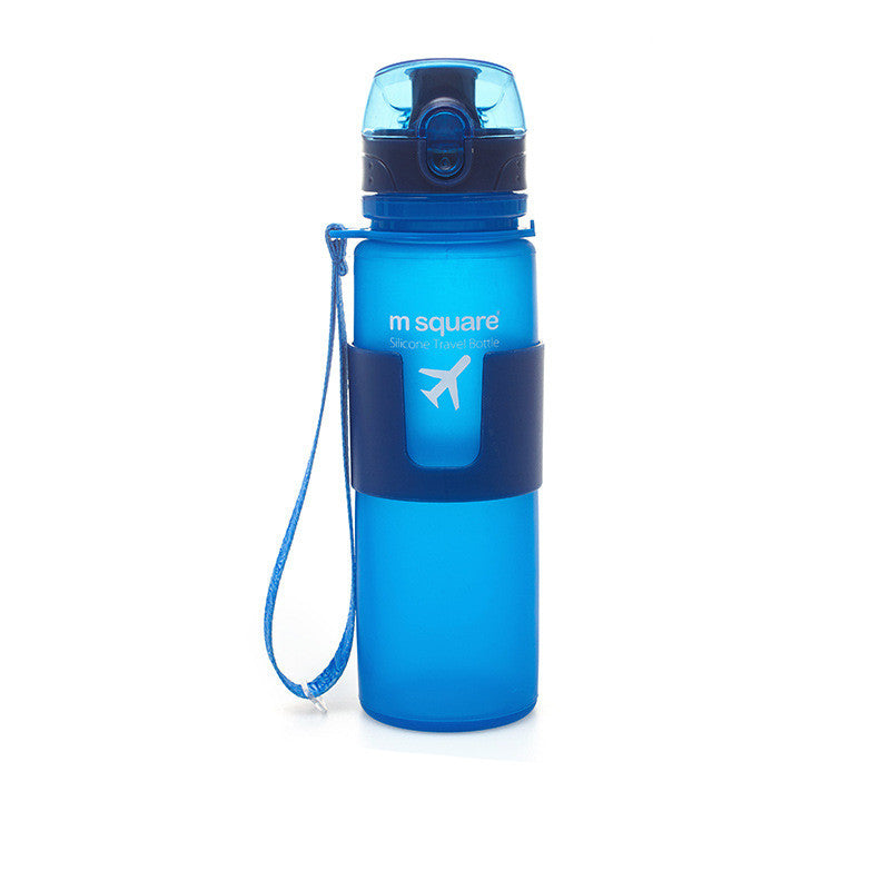 Blue silicone travel water bottle with carry strap and flip-up drinking spout