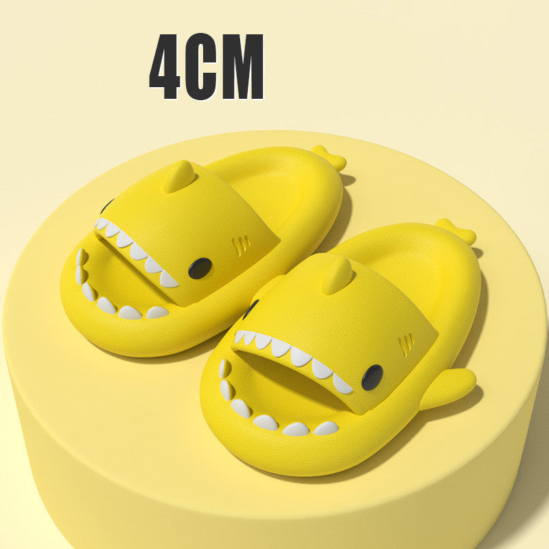 Cartoon shark slippers, soft yellow slide-on sandals with white teeth and small fin details