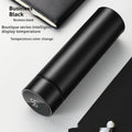 Smart temperature display insulated bottle, matte black, rounded base with green 55°C digits