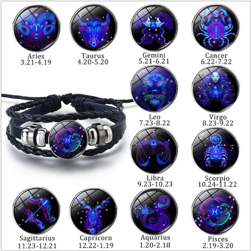 Black braided zodiac bracelet with glowing blue round charm and silver triple-ring clasp