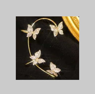 Gold butterfly ear cuff with glitter butterfly charms on circular hoop