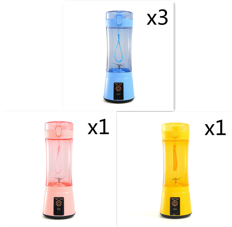Portable electric fruit juicer blender with clear cup and light blue, pink, yellow bases