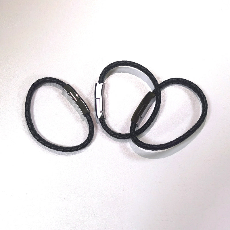Black braided USB charging cable with looped cord and connector ends