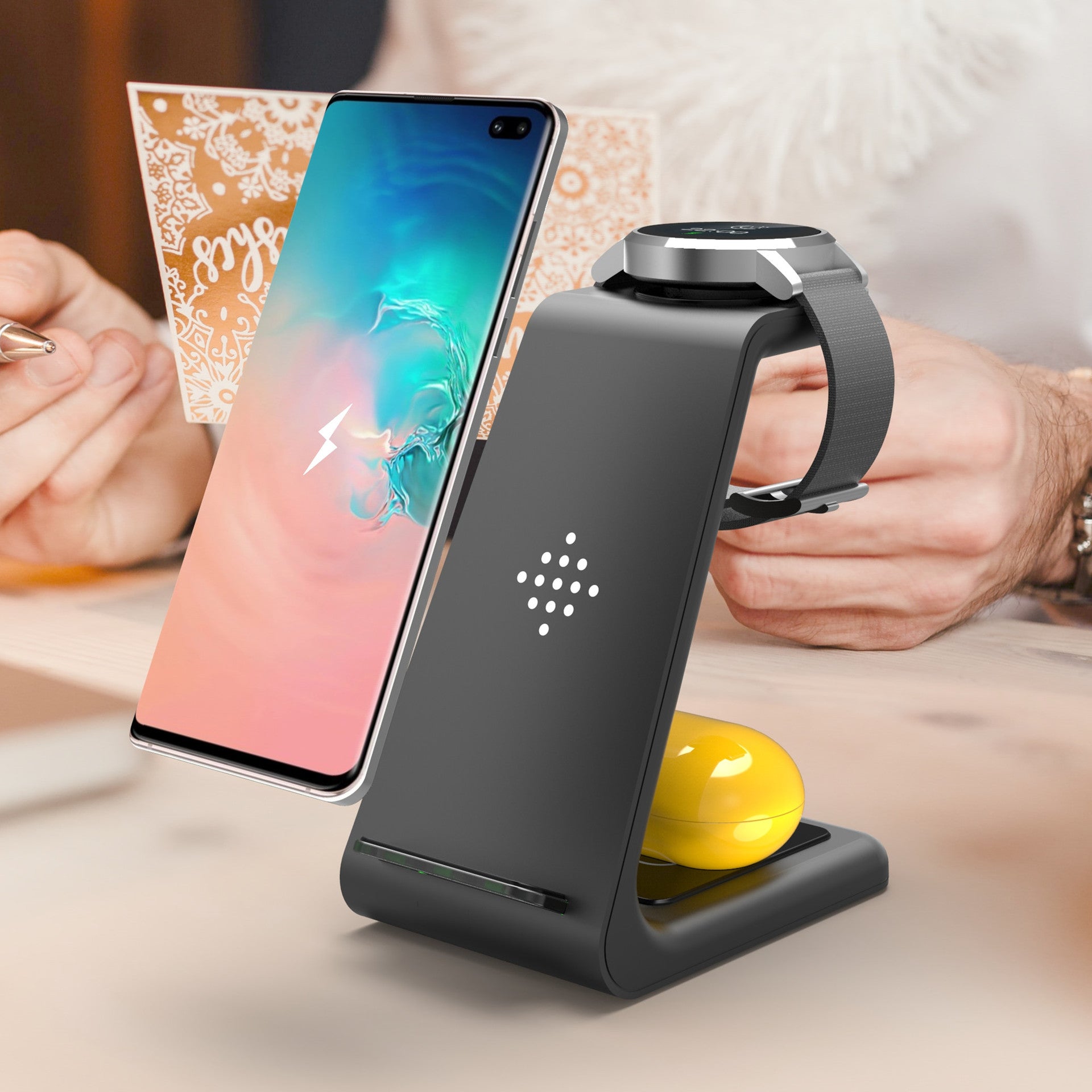 Wireless phone charger stand with phone dock and LED indicator, dark gray body.