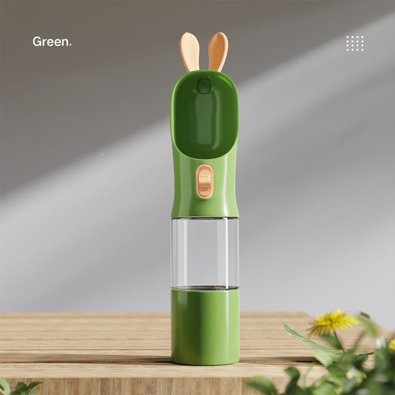 Pet water travel bottle with green lid; clear chamber and green bottom