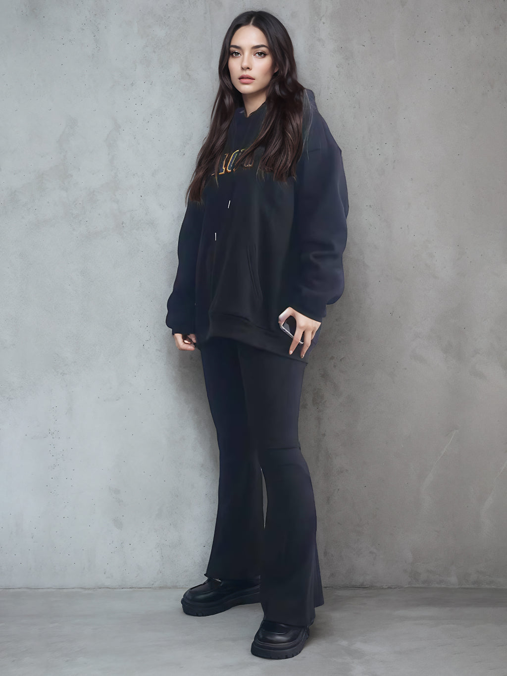 Black long-sleeve hoodie with hood, drawstrings, chest logo print, and kangaroo pocket