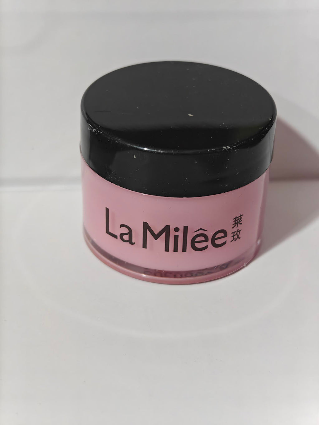 La Milée lip mask jar in pink with black lid