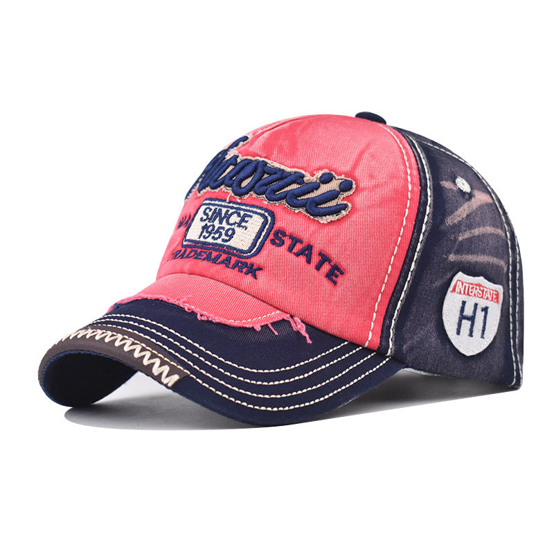 Red and navy baseball cap with embroidered “Since 1959” logo and “HI” badge patch