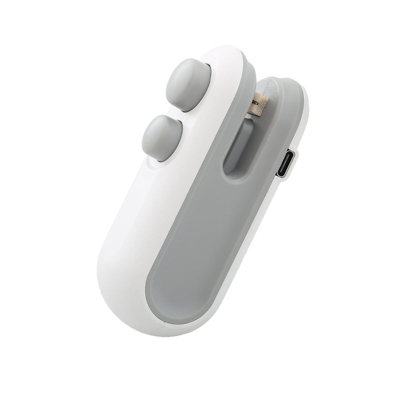 Handheld white heat sealer with dual oval buttons and USB port