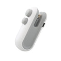 Handheld white heat sealer with oval buttons, USB port on side