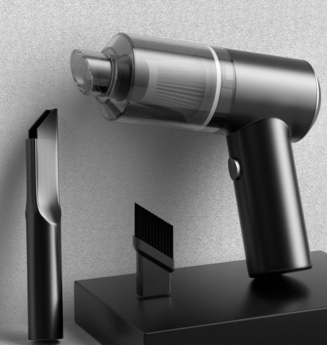 Wireless car vacuum cleaner with black handle and cylindrical dust cup on stand.