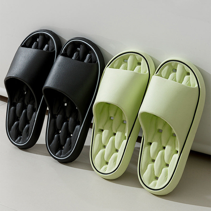Non-slip bathroom slippers set: black and light green open-toe slides with contoured footbed.