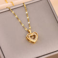 Gold-toned double-layer love necklace with heart charm and rhinestone border