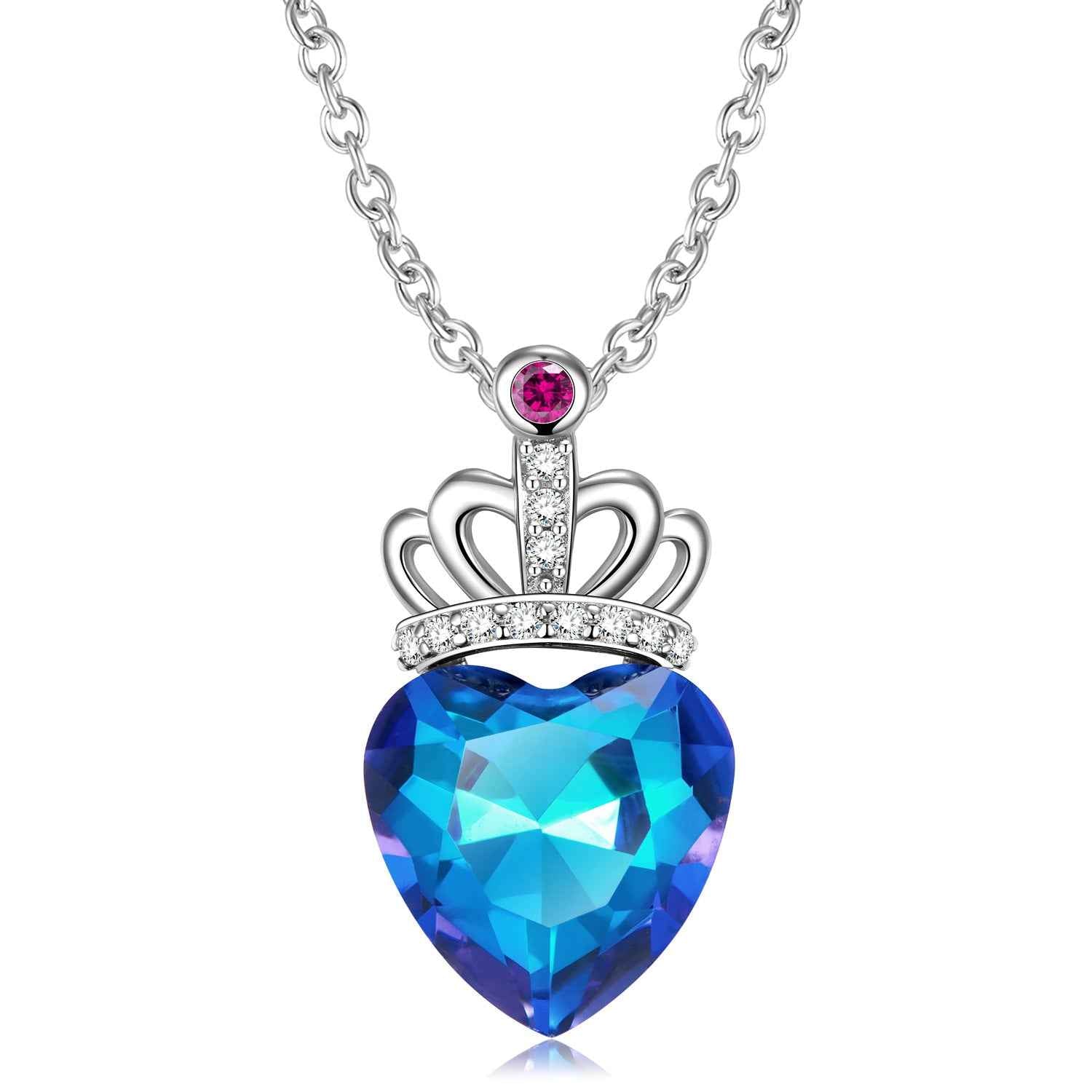 Sterling silver heart pendant necklace with blue faceted stone and pink crown detail