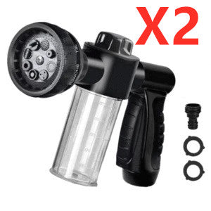 High-pressure foam spray gun with black body and clear cup, nozzle and fittings