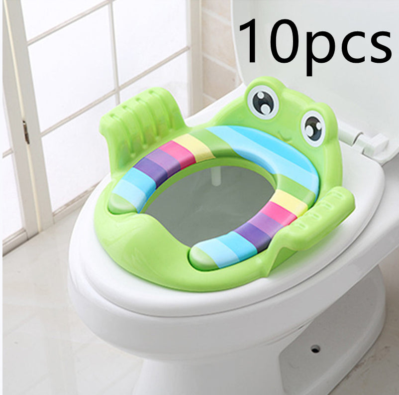 Green toddler toilet seat 10-pack with animal face, striped rim, and side grips